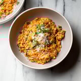 A comforting pasta dish with spinach and melted cheese.
